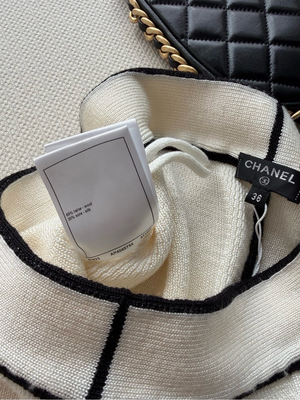 CHANEL Cream Midi Skirt with Black Trim and Logo Accent - Picture 7 of 7